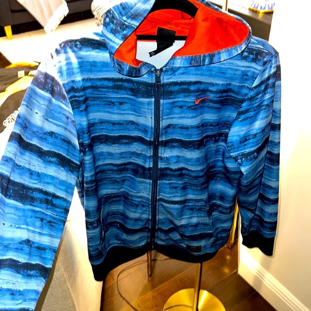 Boys blue multi color  Nike large 12/13 jacket . Lightweight with orange accent